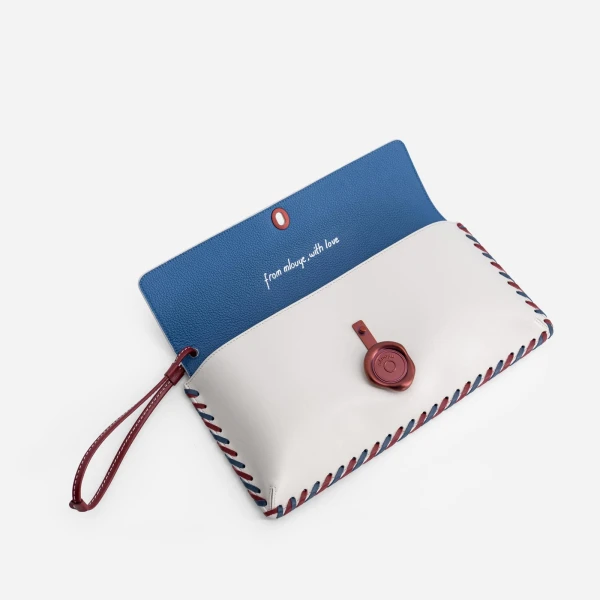 Mlouye Seal Clutch in Off White | Clutch Bags | Luxury Shoes 