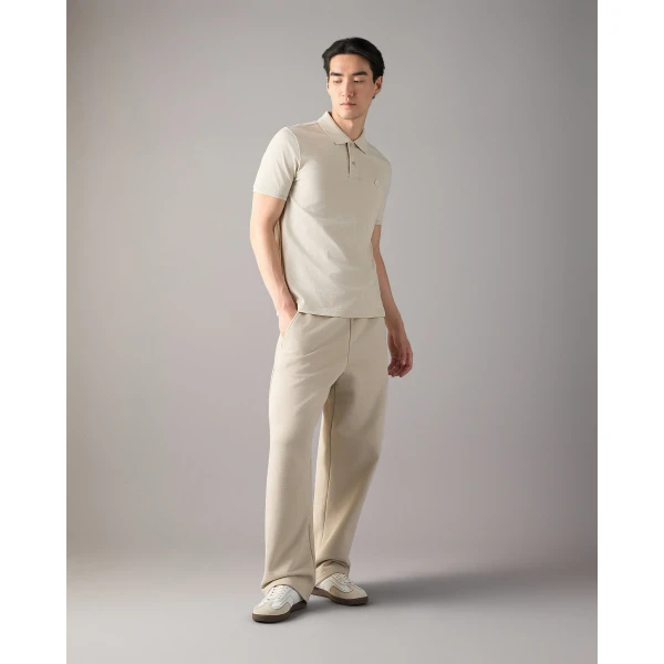 Moose Knuckles YUL Polo in Alabaster | T-shirts & vests | Luxury Shoes 
