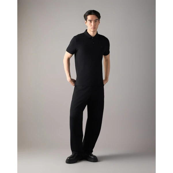 Moose Knuckles YUL Polo in Black | T-shirts & vests | Luxury Shoes 