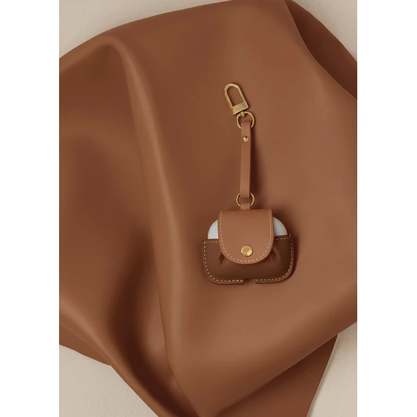 Polène AirPods Case in Duo Camel, view 2 | Phone Cases | Luxury Shoes 