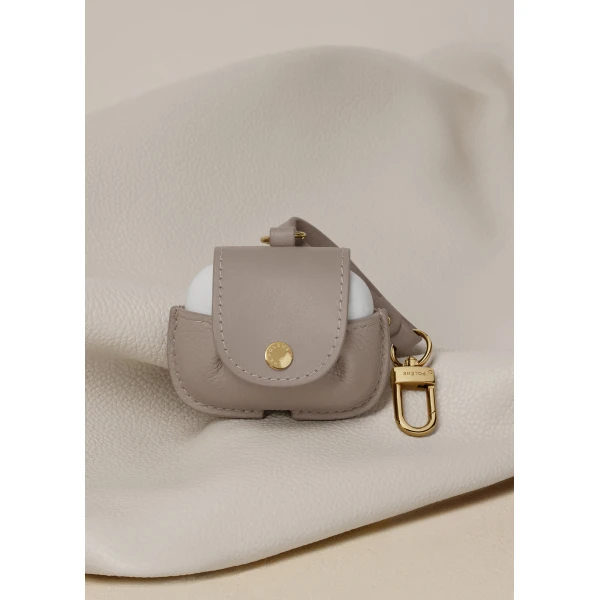 Polène AirPods Case in Duo Taupe, view 3 | Phone Cases | Luxury Shoes 