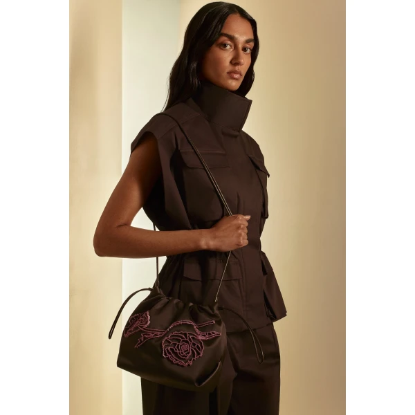 Scanlan Theodore Beaded Poppy Drawstring Bag in Chocolate Fuchsia | Bucket Bags | Luxury Shoes 