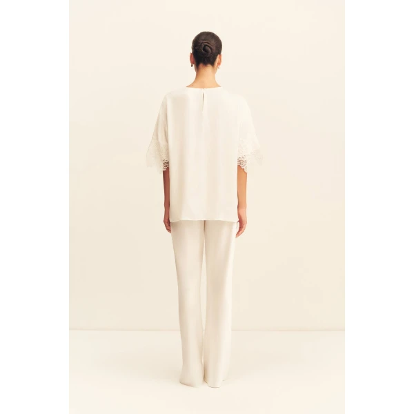 designer tops at Luxury Shoes 