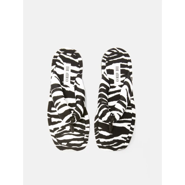 The Attico Indie Flat Thong Sandals in White and Black | Flats | Luxury Shoes 