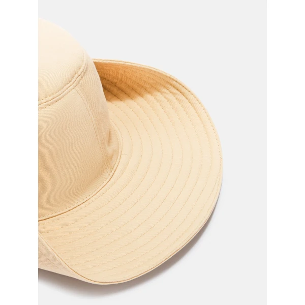 The Attico Logo Bucket Cap in Faded Ecru | Hats | Luxury Shoes 