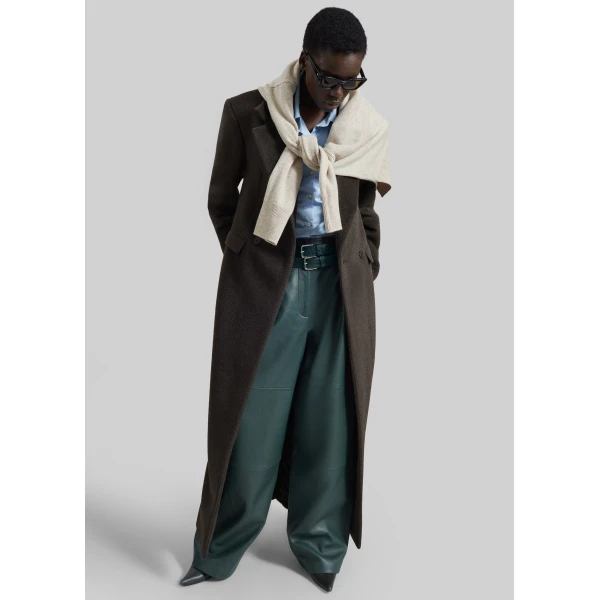 The Frankie Shop Jeva Faux Leather Double Belt Loop Trousers in Bottle Green, view 6