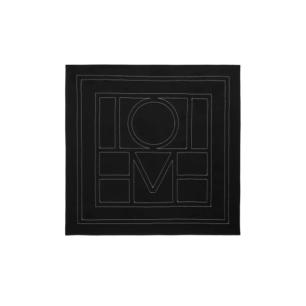 Toteme Embroidered monogram silk scarf in Black