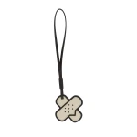 Valextra Bandaid Charm in Pergamena White and Black | Bag charms | Luxury Shoes 