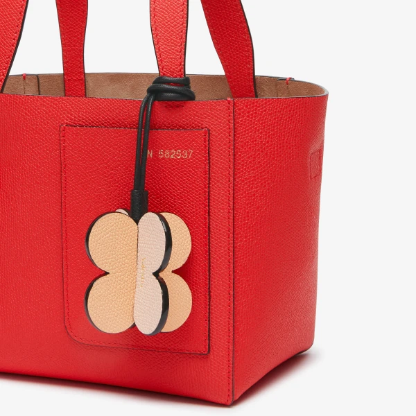 Valextra Four-Leaf Clover Charm in Orange Sunset, Bonne Mine Pink and Black | Bag charms | Luxury Shoes 