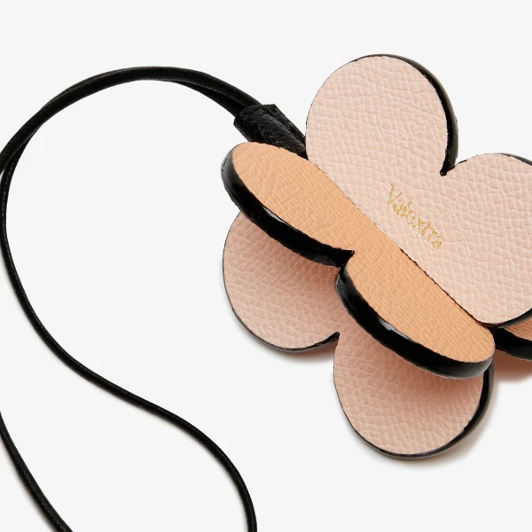 Valextra Four-Leaf Clover Charm in Orange Sunset, Bonne Mine Pink and Black | Bag charms | Luxury Shoes 