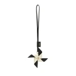 Valextra Pinwheel Charm in Black and Pergamena White | Bag charms | Luxury Shoes 